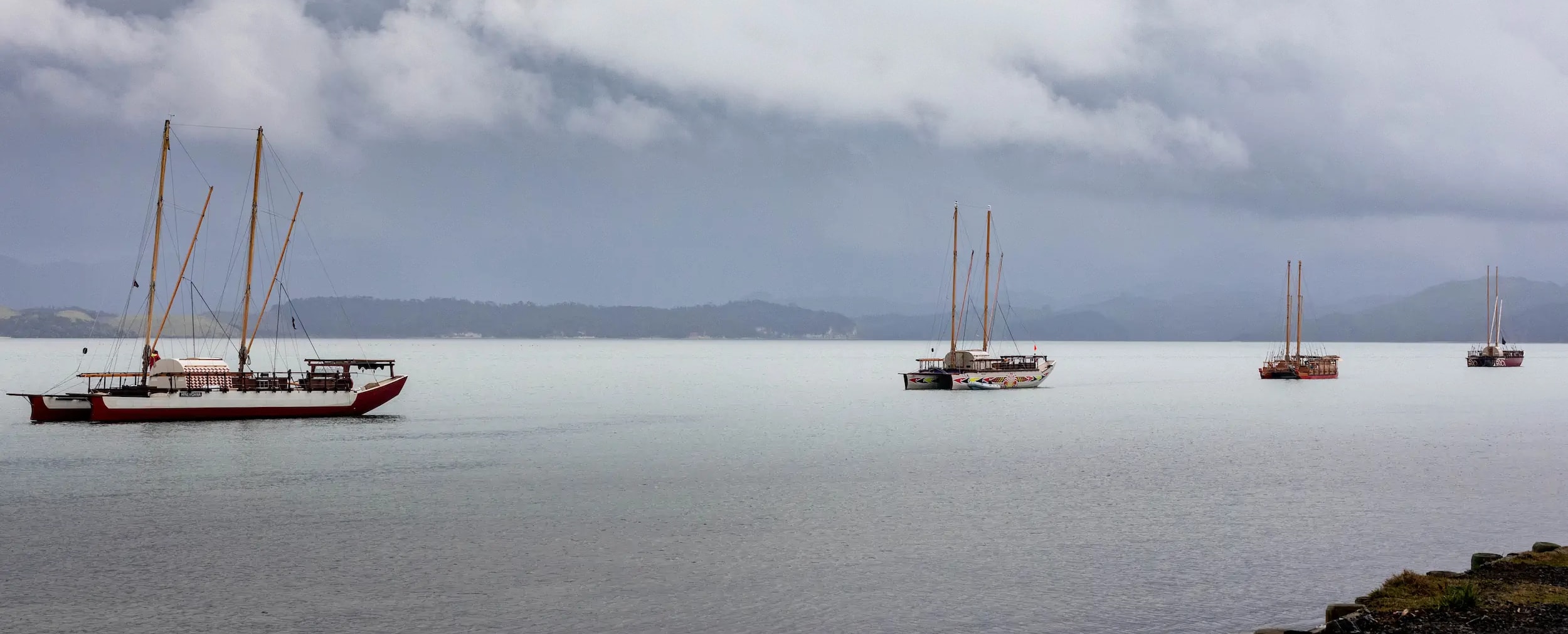 Waka Haurua at anchor on the water